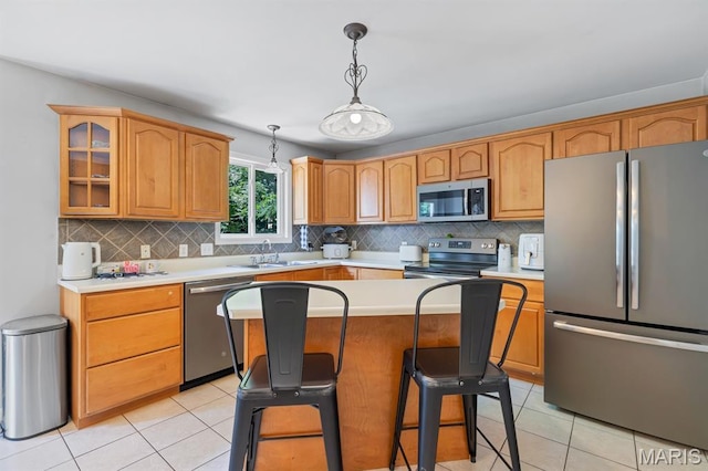 25 Saint Kathleen Ct, Troy, MO 63379 - kitchen with appliances with stainless steel finishes, light tile patterned floors, and backsplash