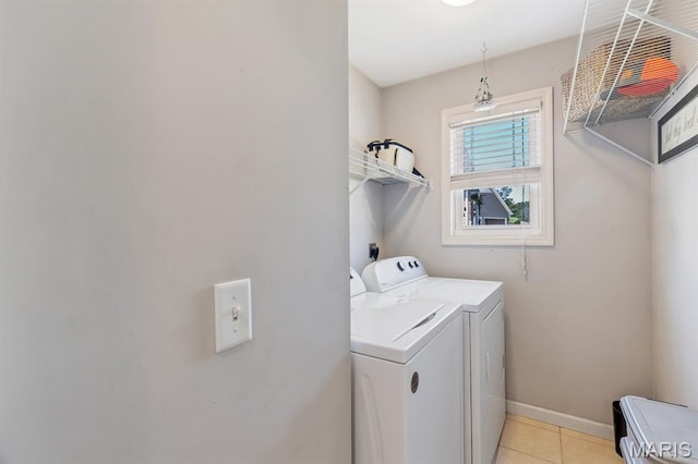 25 Saint Kathleen Ct, Troy, MO 63379 - laundry area with independent washer and dryer and light tile patterned flooring