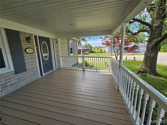202 Harris, Steeleville, IL 62288 - wooden porch featuring a lawn