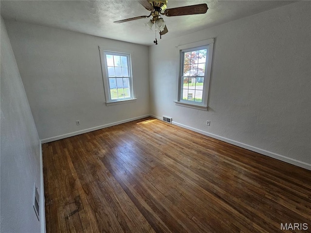 202 Harris, Steeleville, IL 62288 - unfurnished room with wood finished floors, ceiling fan, and a textured wall