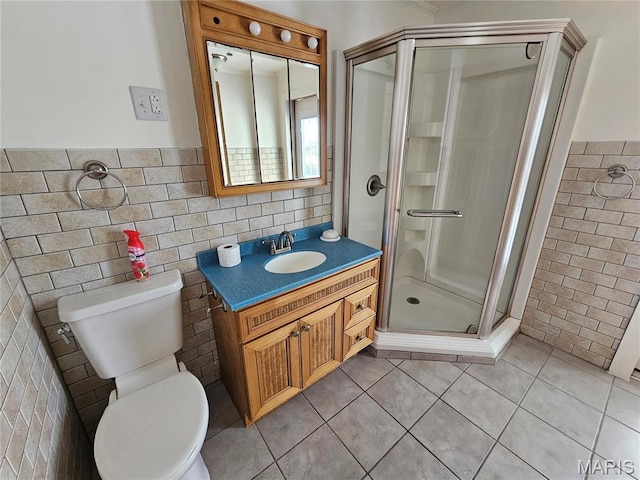 202 Harris, Steeleville, IL 62288 - full bath with tile walls, vanity, a shower stall, tile patterned floors, and a wainscoted wall