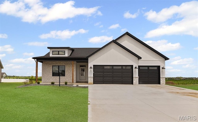 3131 Ashley Dr, Glen Carbon, IL 62034 - modern inspired farmhouse with stone siding, a front lawn, and a garage