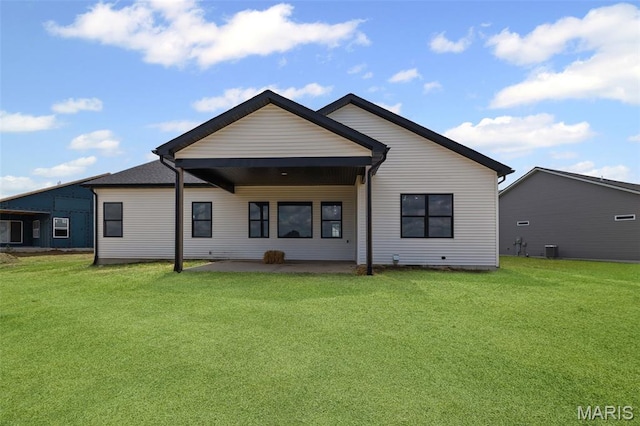3131 Ashley Dr, Glen Carbon, IL 62034 - back of house featuring a patio area and a yard