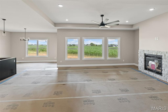3131 Ashley Dr, Glen Carbon, IL 62034 - unfurnished living room featuring ceiling fan, a stone fireplace, and recessed lighting