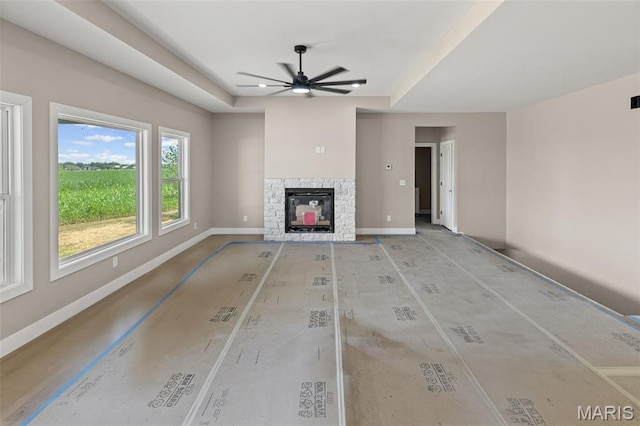 3131 Ashley Dr, Glen Carbon, IL 62034 - unfurnished living room with a ceiling fan and a fireplace
