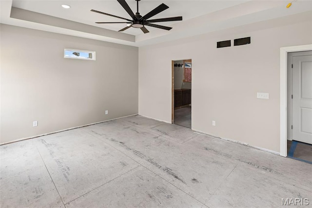 3131 Ashley Dr, Glen Carbon, IL 62034 - spare room featuring a raised ceiling, ceiling fan, and recessed lighting