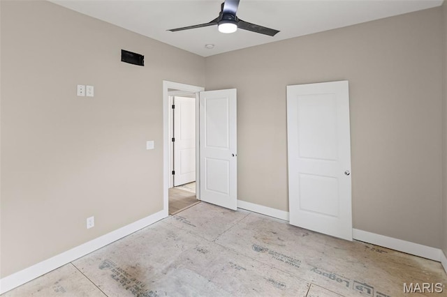 3131 Ashley Dr, Glen Carbon, IL 62034 - unfurnished bedroom with baseboards and a ceiling fan