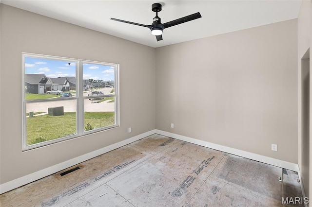 3131 Ashley Dr, Glen Carbon, IL 62034 - unfurnished room featuring plenty of natural light and a ceiling fan