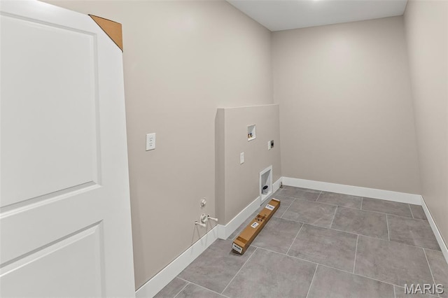 3131 Ashley Dr, Glen Carbon, IL 62034 - laundry room with hookup for a gas dryer, hookup for a washing machine, electric dryer hookup, and tile patterned floors