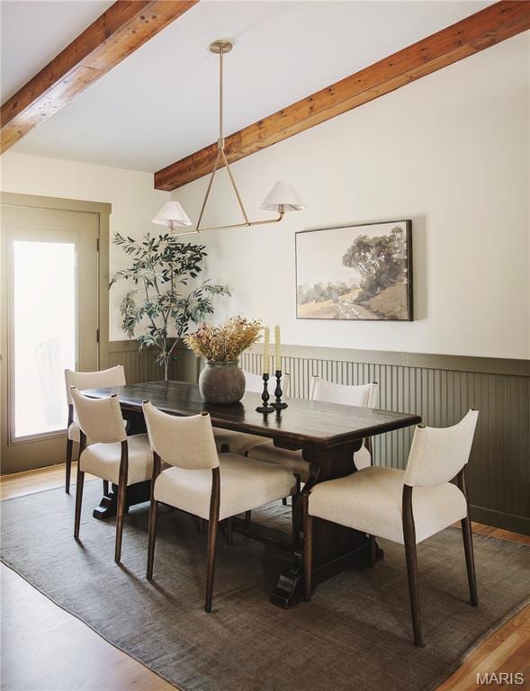 10 Marcus Dr, Saint Peters, MO 63376 - dining space with wood finished floors, beamed ceiling, and wainscoting