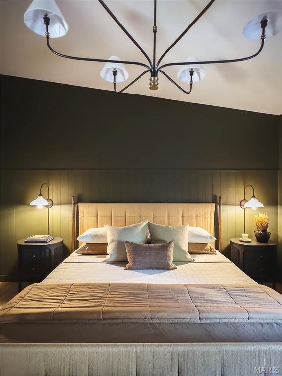 10 Marcus Dr, Saint Peters, MO 63376 - bedroom featuring a chandelier