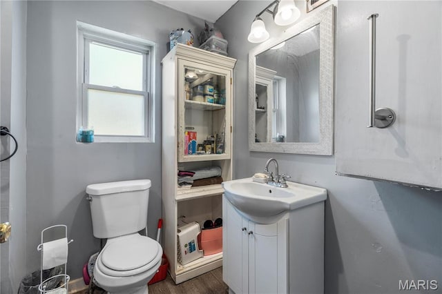 5211 Fletcher St, Jennings, MO 63136 - bathroom featuring vanity and wood finished floors