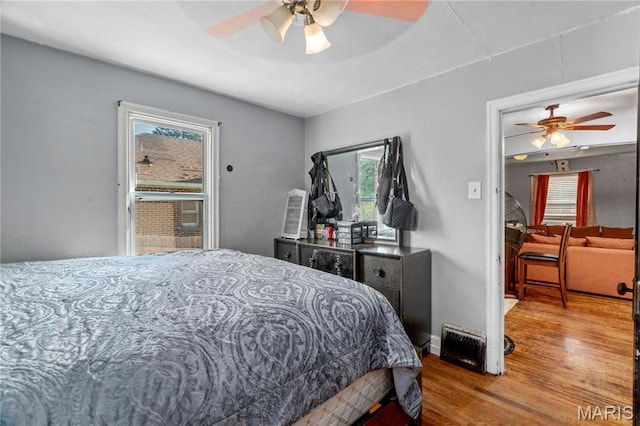 5211 Fletcher St, Jennings, MO 63136 - bedroom featuring wood finished floors and a ceiling fan