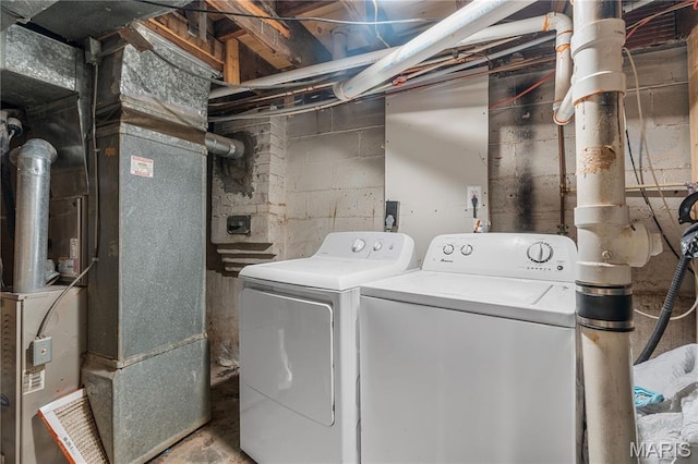 5211 Fletcher St, Jennings, MO 63136 - laundry area featuring separate washer and dryer