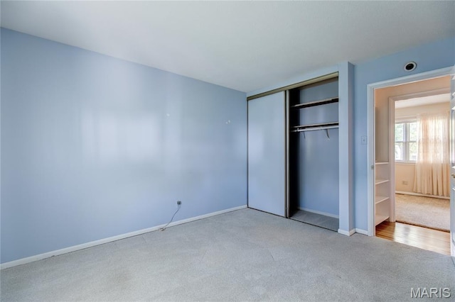 4828 Plum Tree Ln, Hazelwood, MO 63042 - unfurnished bedroom featuring carpet floors and a closet