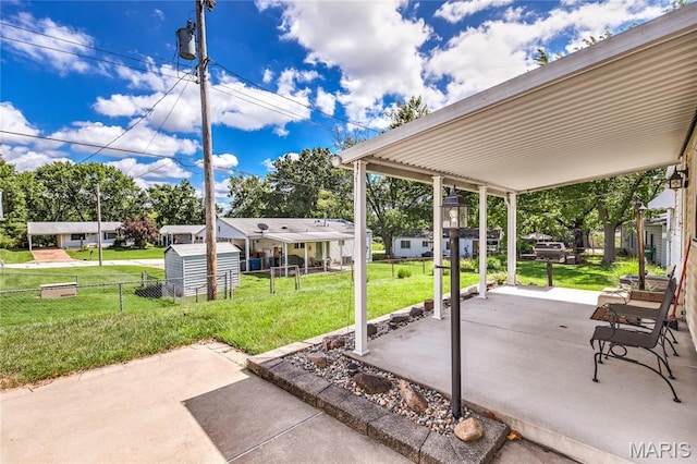 4828 Plum Tree Ln, Hazelwood, MO 63042 - view of patio with a shed