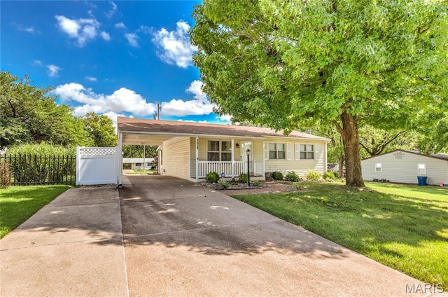 4828 Plum Tree Ln, Hazelwood, MO 63042 - ranch-style home featuring a porch, concrete driveway, and a carport