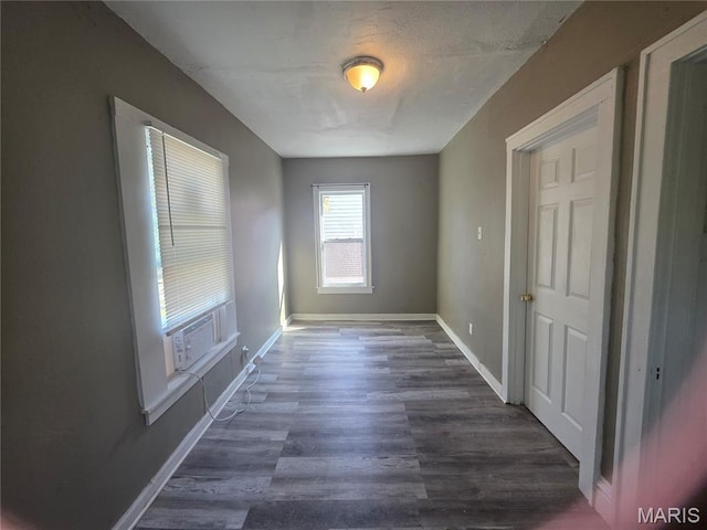 3421 Belt Ave, Saint Louis, MO 63120 - unfurnished room with baseboards and dark wood finished floors