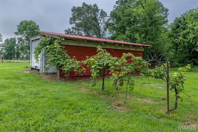 136 County Road 4415, Poplar Bluff, MO 63901 - view of grassy yard featuring an outbuilding
