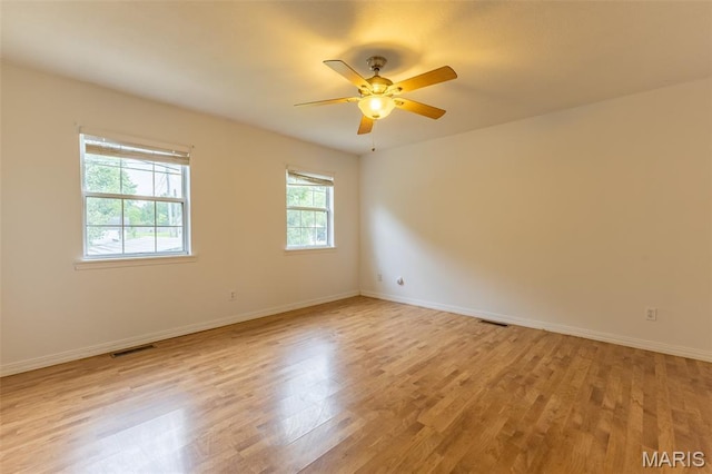 136 County Road 4415, Poplar Bluff, MO 63901 - unfurnished room featuring light wood finished floors and a ceiling fan