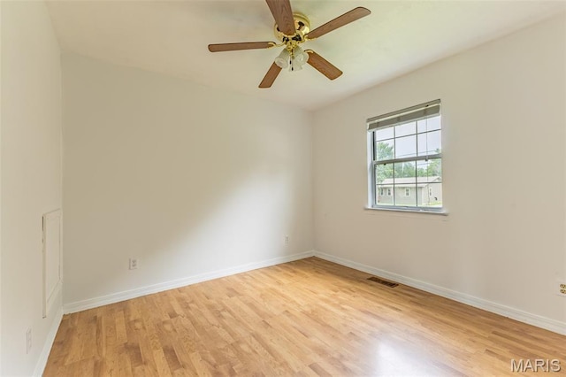 136 County Road 4415, Poplar Bluff, MO 63901 - empty room with light wood finished floors and ceiling fan