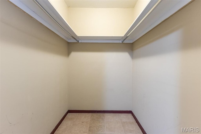 136 County Road 4415, Poplar Bluff, MO 63901 - spacious closet with light tile patterned floors