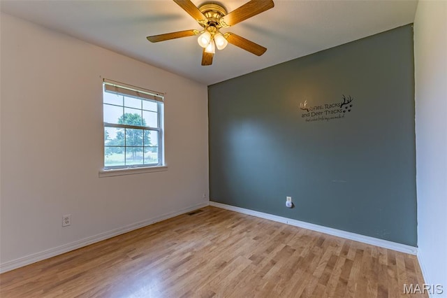 136 County Road 4415, Poplar Bluff, MO 63901 - empty room with light wood finished floors and ceiling fan