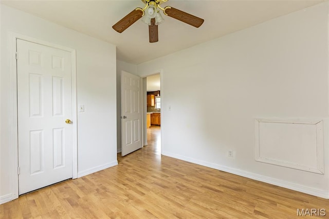 136 County Road 4415, Poplar Bluff, MO 63901 - unfurnished bedroom featuring light wood-type flooring and a ceiling fan