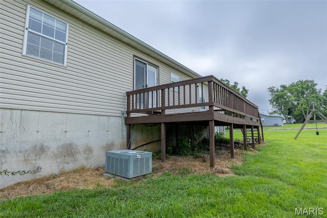 136 County Road 4415, Poplar Bluff, MO 63901 - rear view of house with a deck, a yard, and stairway