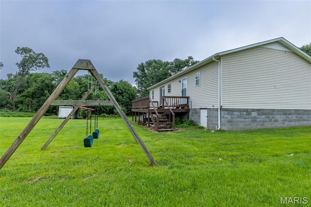 136 County Road 4415, Poplar Bluff, MO 63901 - view of green lawn featuring a deck and stairway