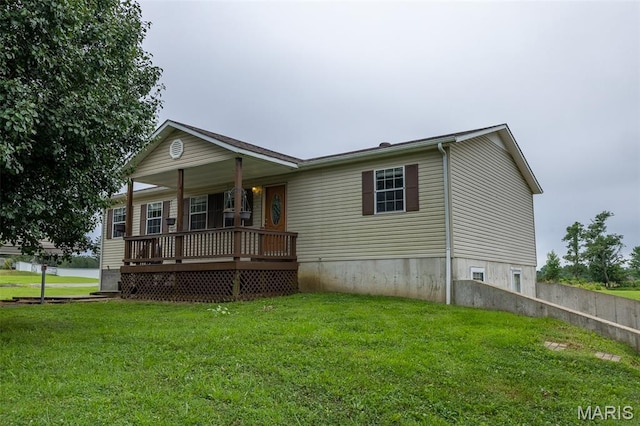 136 County Road 4415, Poplar Bluff, MO 63901 - view of front of home with covered porch and a front lawn