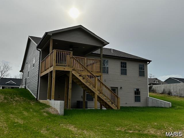 259 Broch Tuarach Pl, Jackson, MO 63755 - rear view of house with stairs, a yard, a ceiling fan, and a wooden deck