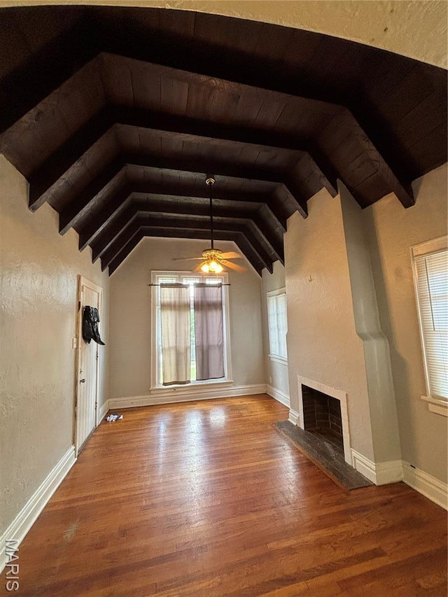 6104 N Pointe Blvd, Saint Louis, MO 63147 - unfurnished living room featuring wood finished floors, a fireplace, a textured wall, a ceiling fan, and wooden ceiling