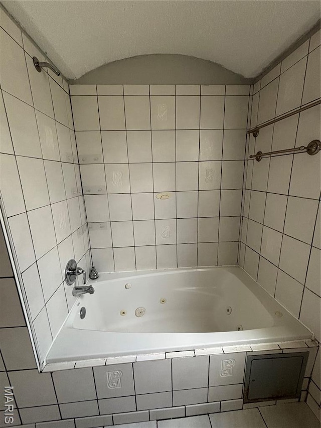 6104 N Pointe Blvd, Saint Louis, MO 63147 - full bathroom featuring a combined bath / shower with jetted tub and tile patterned flooring