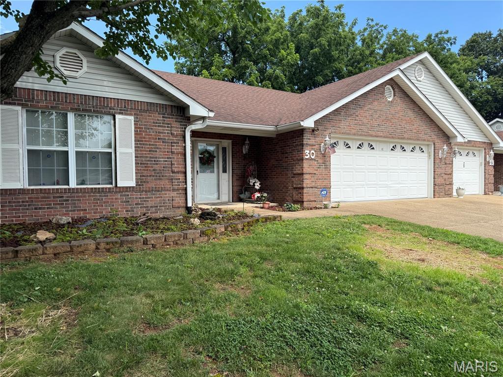 530 Ashbrook Unit 30, Farmington, MO 63640 - ranch-style home with a garage, a front lawn, brick siding, driveway, and a shingled roof