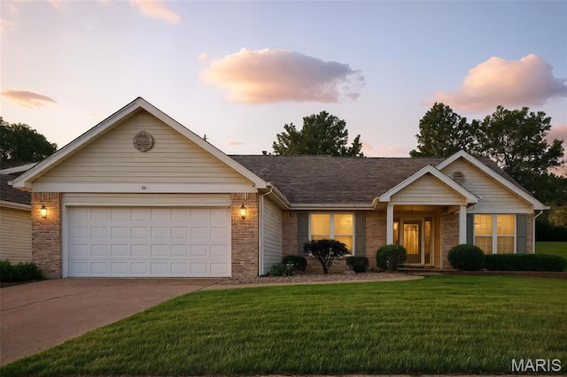 36 Mountain Laurel Dr, Saint Peters, MO 63376 - single story home featuring brick siding, concrete driveway, a yard, and an attached garage