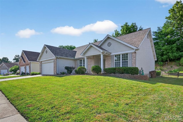 36 Mountain Laurel Dr, Saint Peters, MO 63376 - view of front of house featuring brick siding, driveway, a garage, and a shingled roof