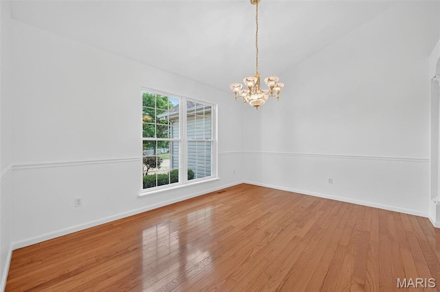 36 Mountain Laurel Dr, Saint Peters, MO 63376 - empty room with wood-type flooring and a chandelier