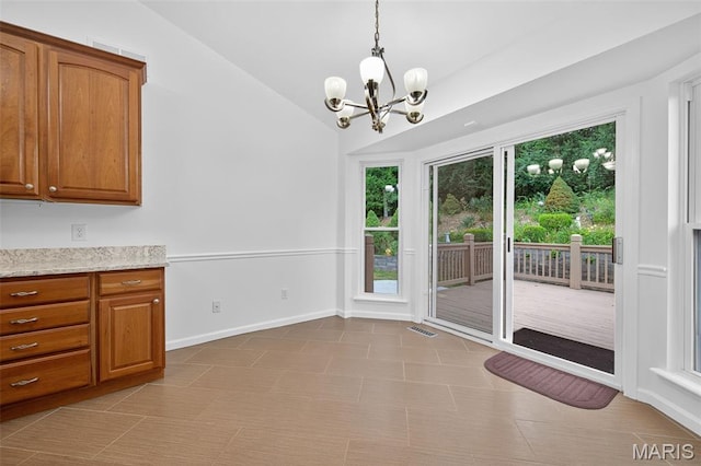 36 Mountain Laurel Dr, Saint Peters, MO 63376 - unfurnished dining area with lofted ceiling and a chandelier