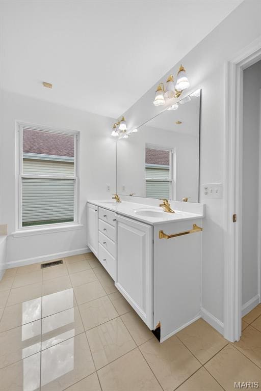 36 Mountain Laurel Dr, Saint Peters, MO 63376 - bathroom featuring double vanity and tile patterned floors