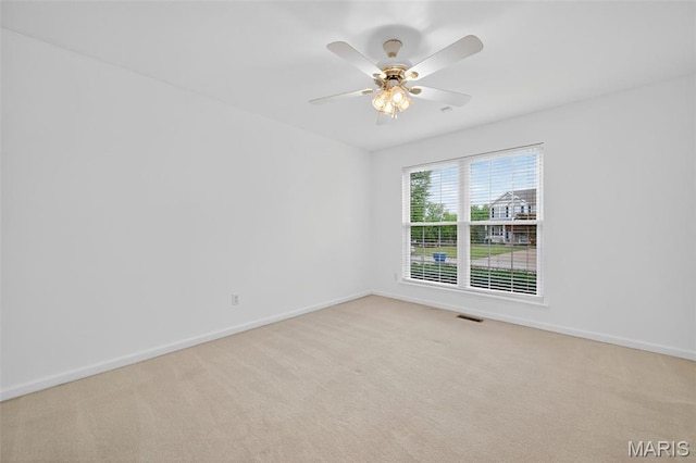 36 Mountain Laurel Dr, Saint Peters, MO 63376 - empty room with light colored carpet and a ceiling fan