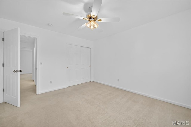 36 Mountain Laurel Dr, Saint Peters, MO 63376 - unfurnished bedroom with light colored carpet, a closet, and ceiling fan