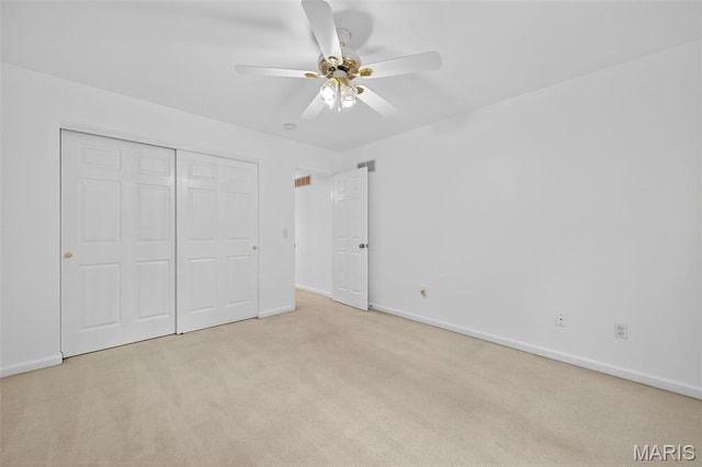 36 Mountain Laurel Dr, Saint Peters, MO 63376 - unfurnished bedroom featuring light colored carpet, a closet, and a ceiling fan
