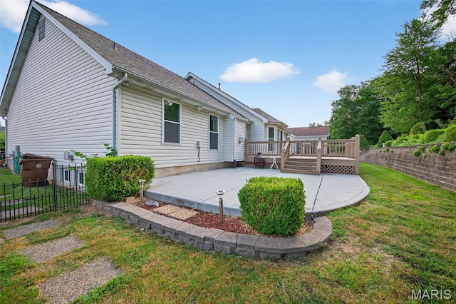 36 Mountain Laurel Dr, Saint Peters, MO 63376 - back of property with a patio area, a wooden deck, and roof with shingles
