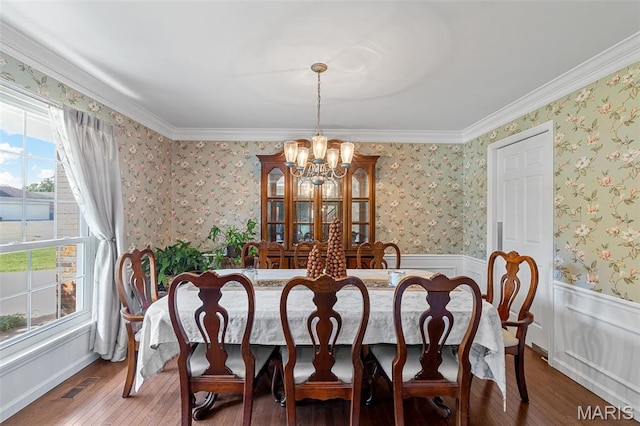 307 Blue Ridge Place Ct, Ballwin, MO 63011 - dining area featuring a chandelier, hardwood / wood-style floors, crown molding, wallpapered walls, and a wainscoted wall