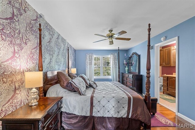 307 Blue Ridge Place Ct, Ballwin, MO 63011 - bedroom featuring wood finished floors, ensuite bath, and ceiling fan