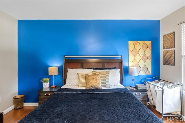 307 Blue Ridge Place Ct, Ballwin, MO 63011 - bedroom featuring wood finished floors and baseboards