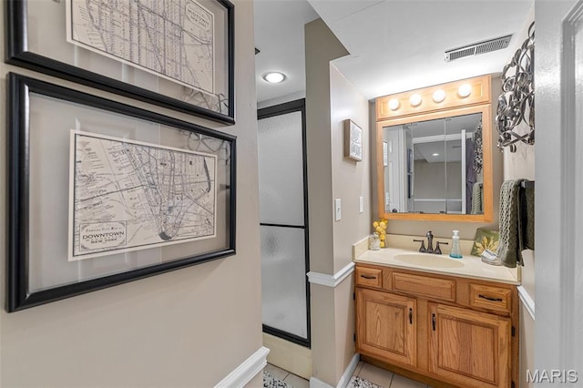 307 Blue Ridge Place Ct, Ballwin, MO 63011 - full bath featuring vanity, tile patterned floors, and a shower with shower door
