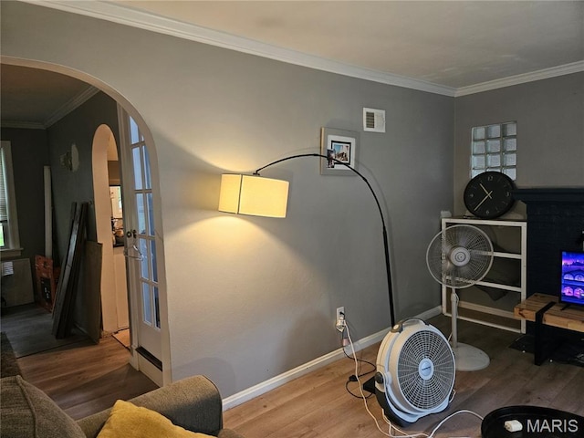 2060 Washington St, Florissant, MO 63033 - interior space with wood finished floors, arched walkways, and crown molding
