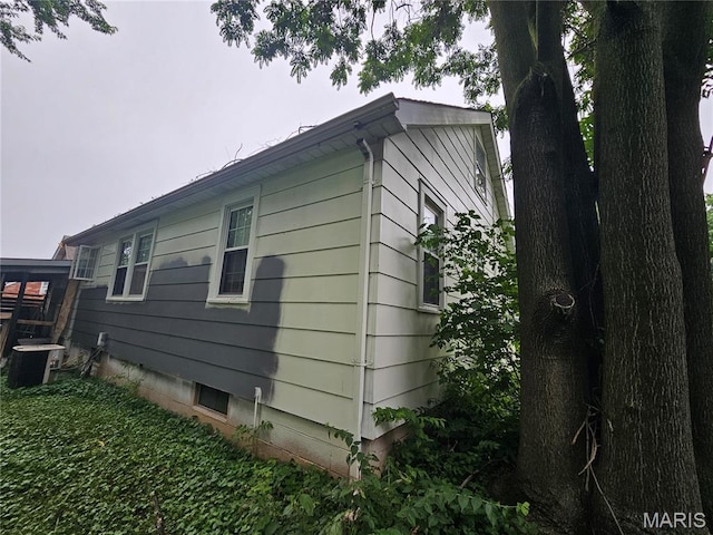 2060 Washington St, Florissant, MO 63033 - view of home's exterior with a central air condition unit